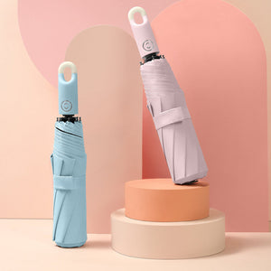 Three-fold self opening and retracting umbrella with buckle