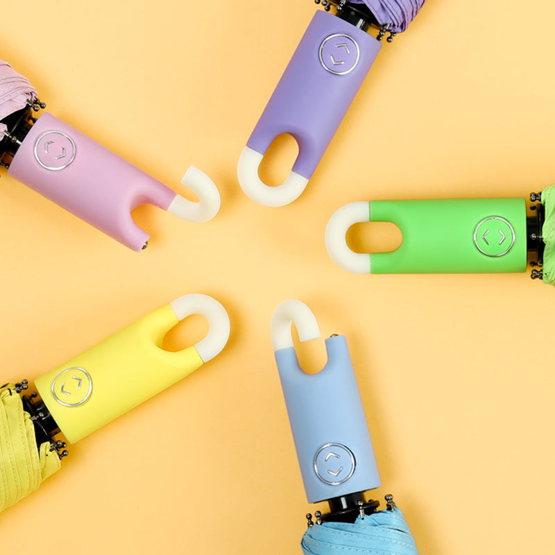 Three-fold self opening and retracting umbrella with buckle